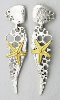 textured earrings in silver with gold starfish